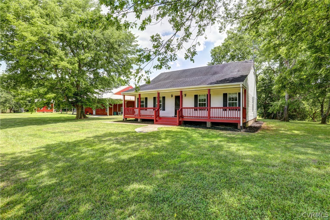 5226 North Warriner Road Richmond, VA 23231 - Photo 36 of 50 a view of an house with backyard space and balcony