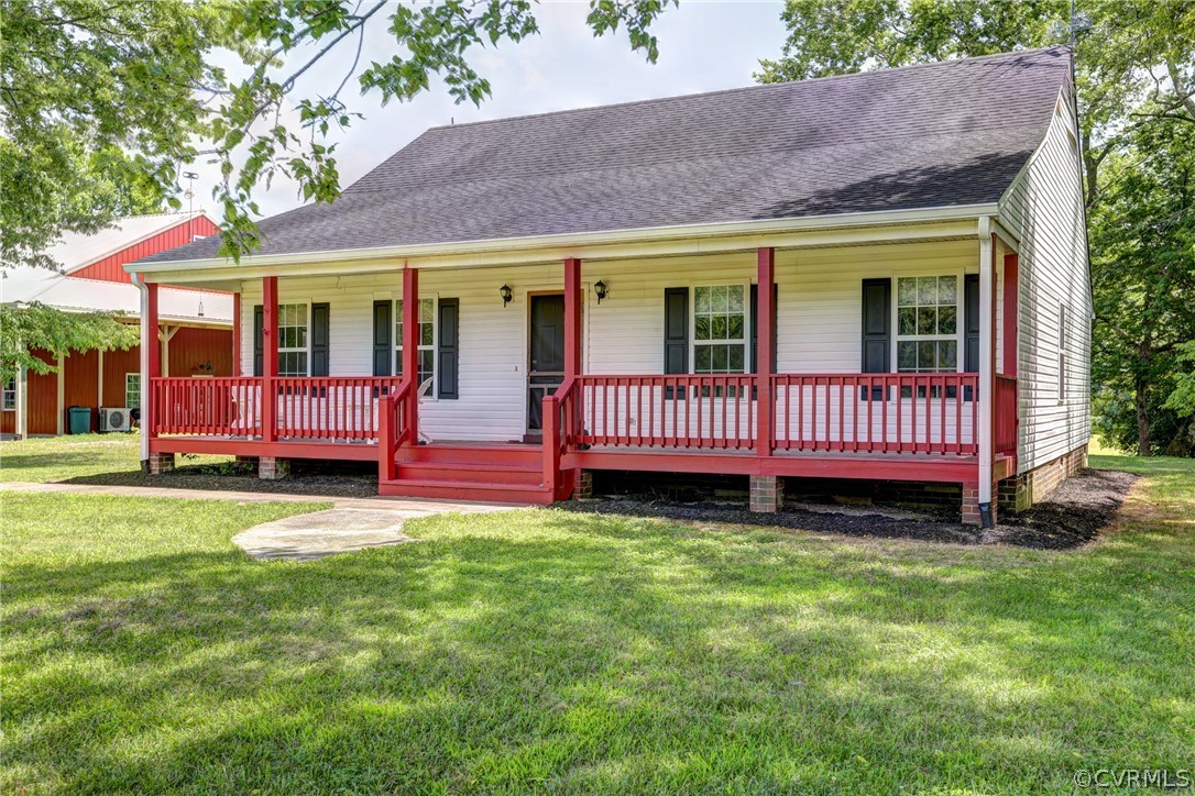 5226 North Warriner Road Richmond, VA 23231 - Photo 5 of 50 a view of a house with a yard porch and wooden fence