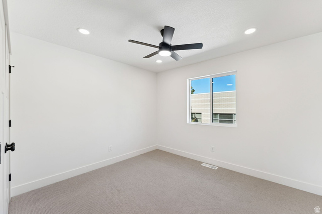 254 North Main Street Bountiful, UT 84010 - Photo 15 of 45 Unfurnished room with carpet flooring, recessed lighting, and ceiling fan