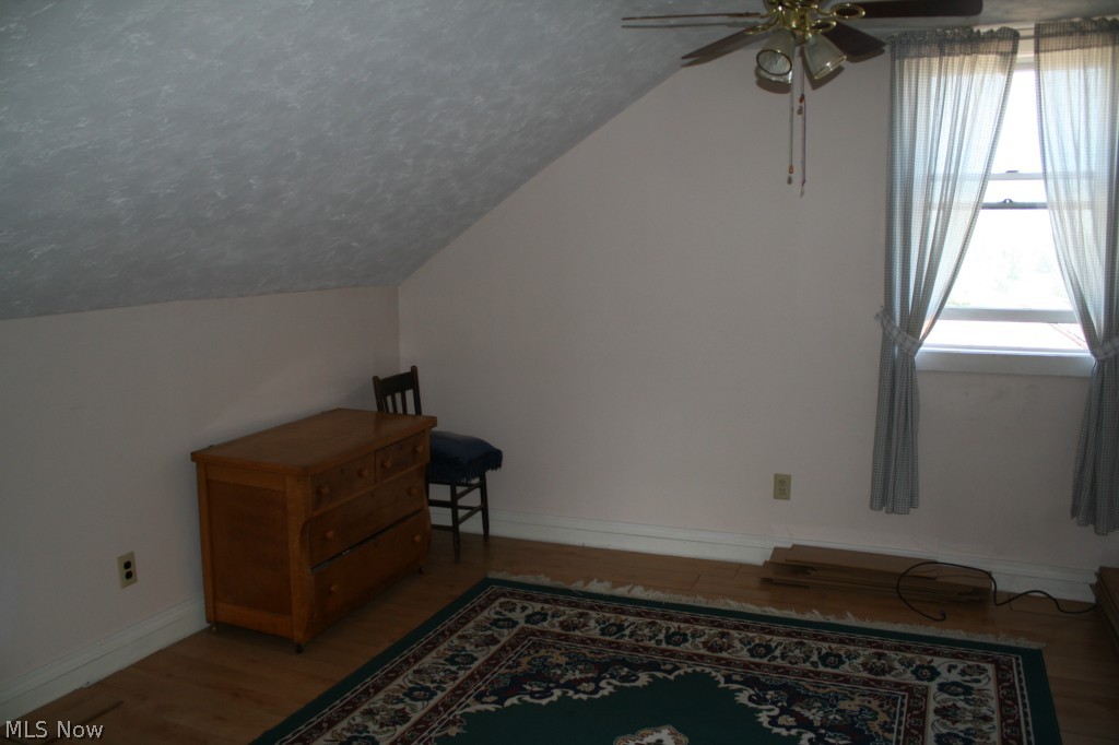 6015 Millbrook Road Shreve, OH 44676 - Photo 18 of 21 the bedrooms upstairs have newly laid flooring, ceiling fans and fresh paint.