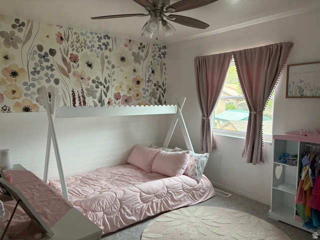 1324 West Raintree Drive, Unit 44 Price, UT 84501 - Photo 9 of 25 White shiplap wall paneling with a botanical-patterned accent wall