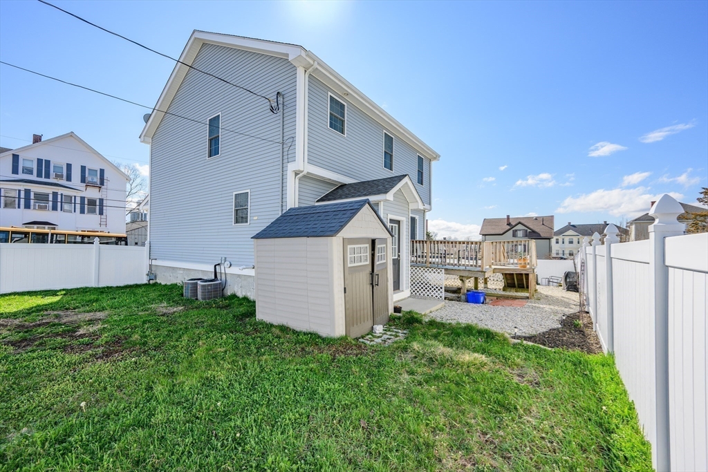 138 Sprague Street Fall River, MA 02724 - Photo 29 of 34 a view of a house with a yard and plants