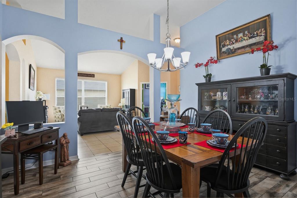 2423 Triggerfish Court Holiday, FL 34691 - Photo 12 of 71 a view of a dining room with furniture