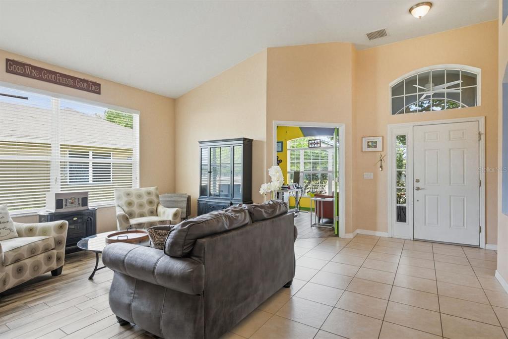 2423 Triggerfish Court Holiday, FL 34691 - Photo 16 of 71 a living room with furniture and windows