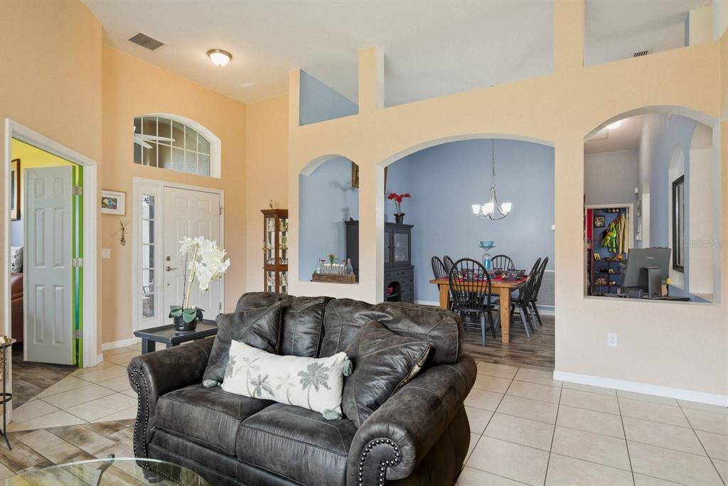 2423 Triggerfish Court Holiday, FL 34691 - Photo 17 of 71 a living room with furniture and wooden floor