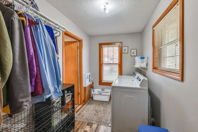 a room with window and furniture