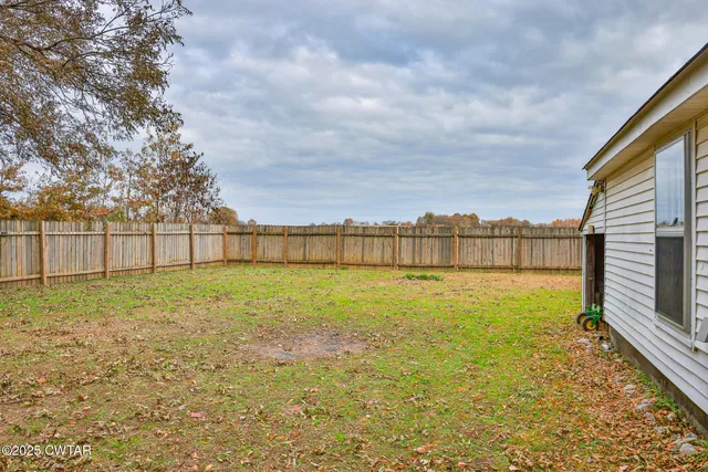 a view of outdoor space and yard
