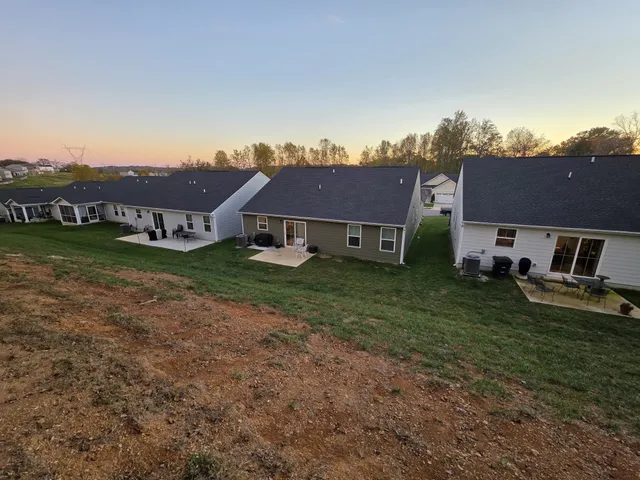 a aerial view of a house with garden