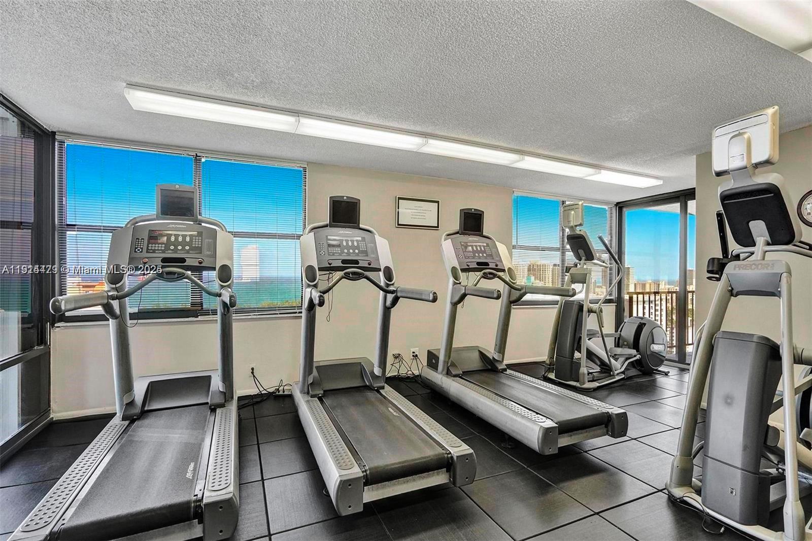 936 Intracoastal Drive, Unit 21A Fort Lauderdale, FL 33304 - Photo 32 of 52 a view of a room with gym equipment