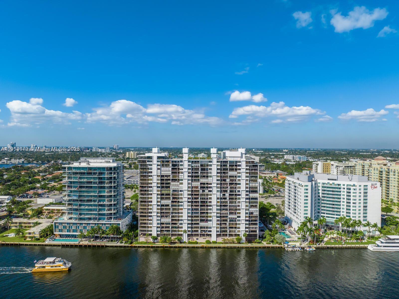 936 Intracoastal Drive, Unit 21A Fort Lauderdale, FL 33304 - Photo 39 of 52 a view of a lake with tall buildings
