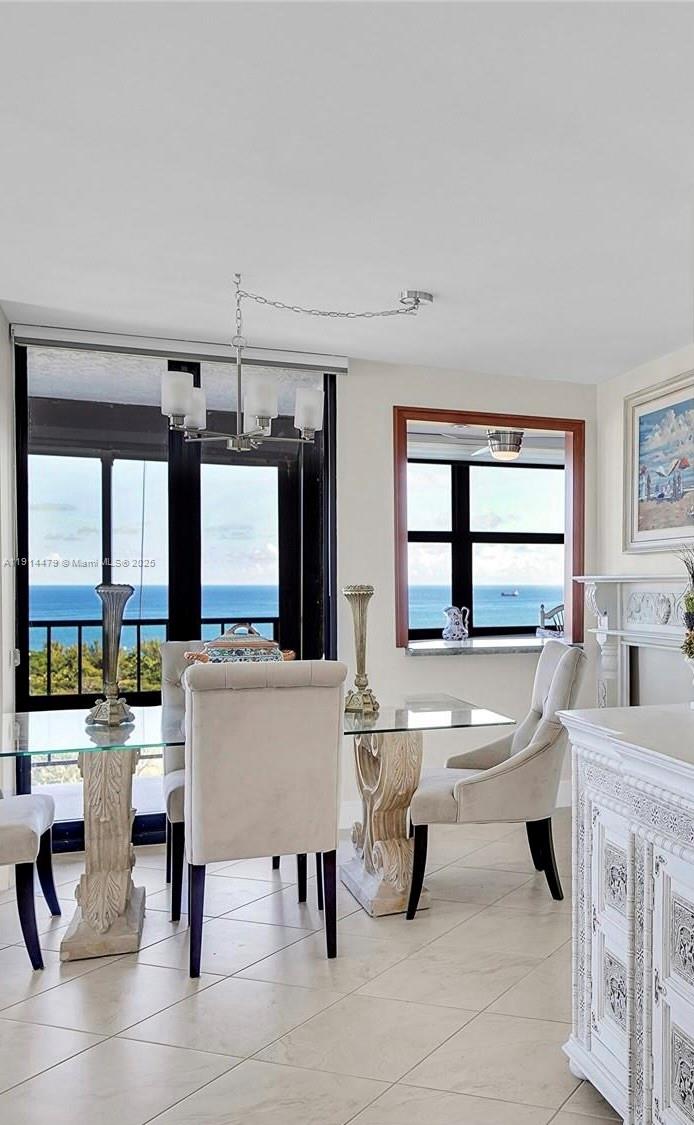 936 Intracoastal Drive, Unit 21A Fort Lauderdale, FL 33304 - Photo 6 of 52 a living room with furniture a large window and white walls