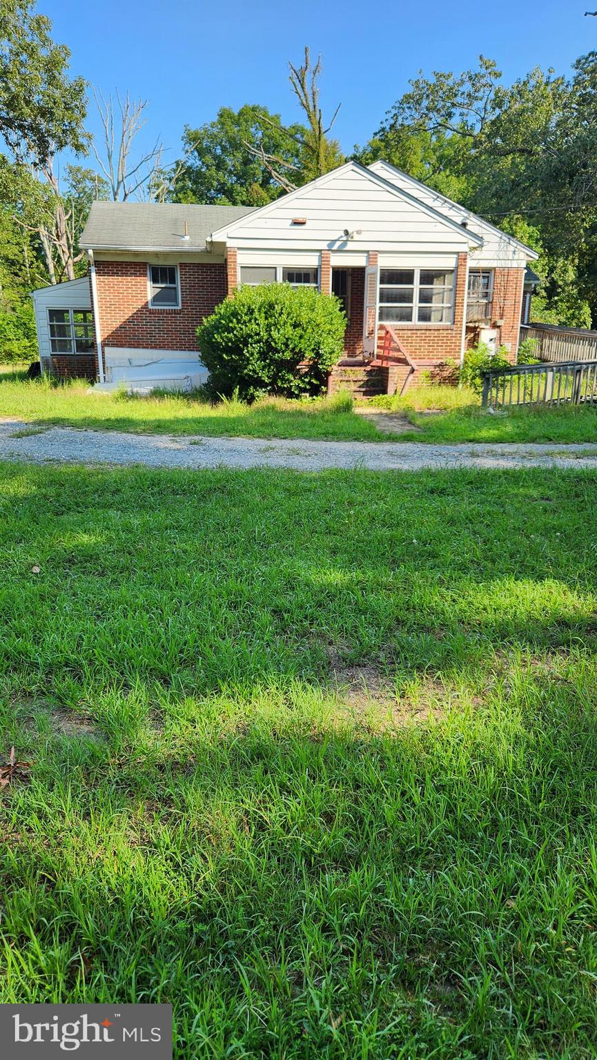 4499 Leonardtown Road Waldorf, MD 20601 - Photo 3 of 11 a front view of a house with a yard