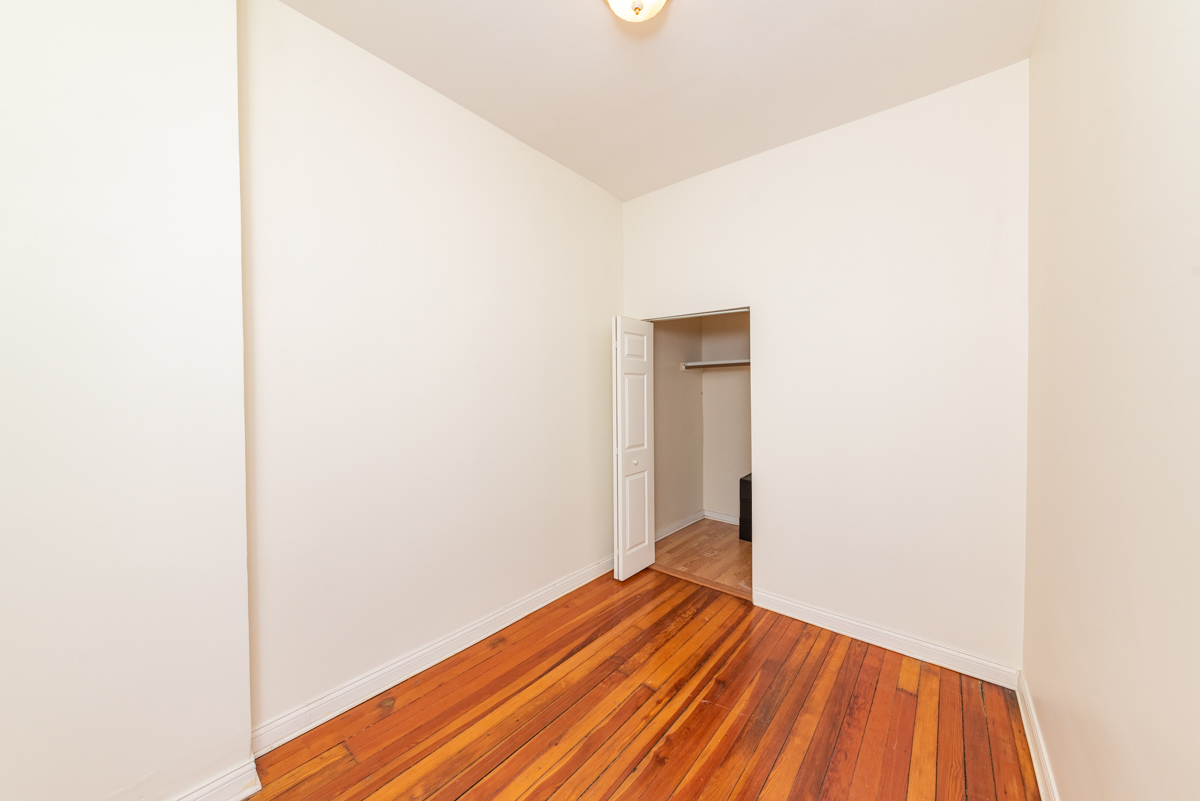 3300 North Racine Avenue, Unit 3 Chicago, IL 60657 - Photo 15 of 17 a view of a room with wooden floor