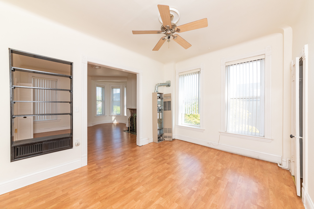 3300 North Racine Avenue, Unit 3 Chicago, IL 60657 - Photo 2 of 17 a view of an empty room with a window