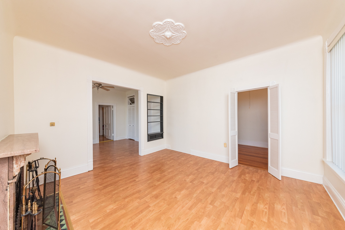 3300 North Racine Avenue, Unit 3 Chicago, IL 60657 - Photo 5 of 17 a view of empty room with wooden floor