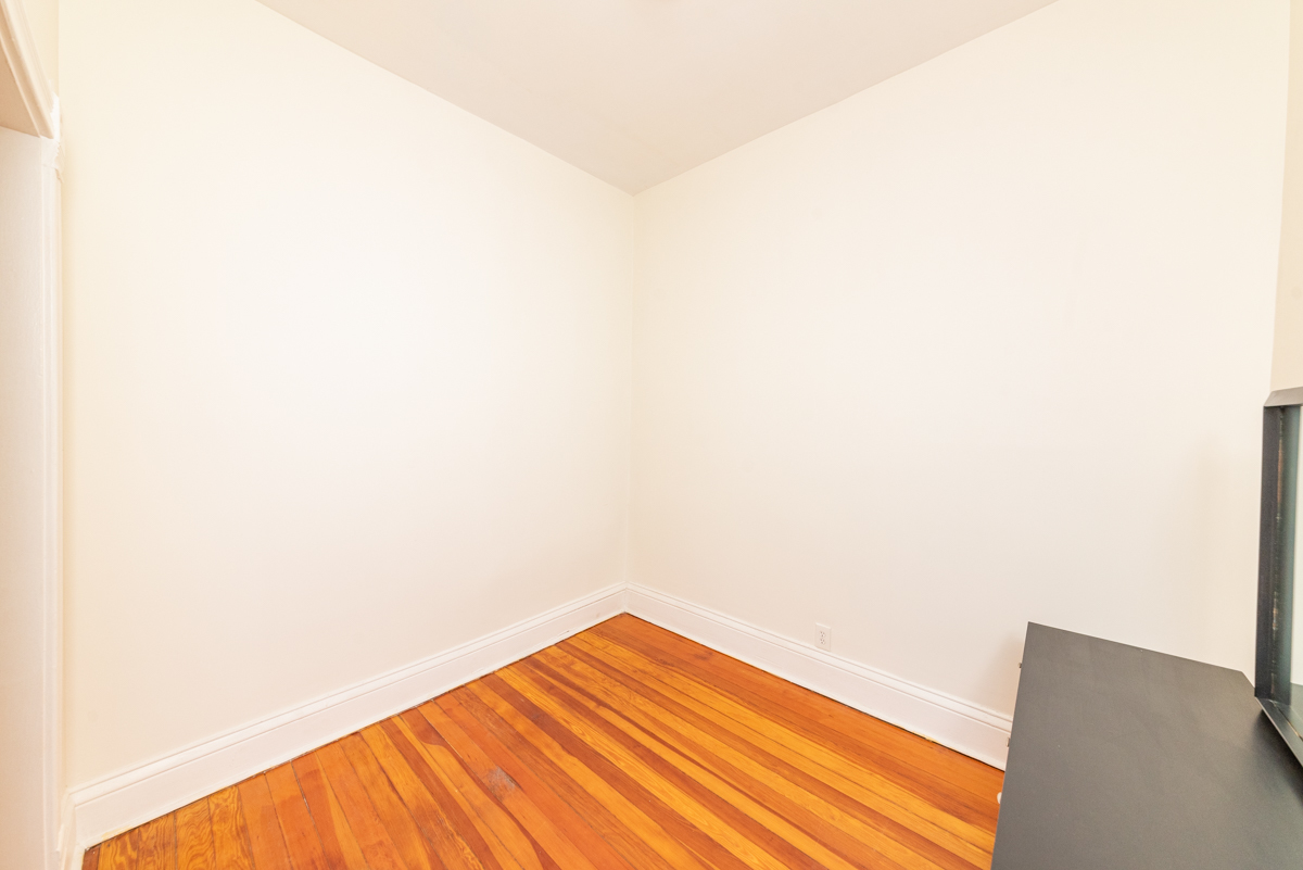 3300 North Racine Avenue, Unit 3 Chicago, IL 60657 - Photo 8 of 17 a view of wooden floor in a room