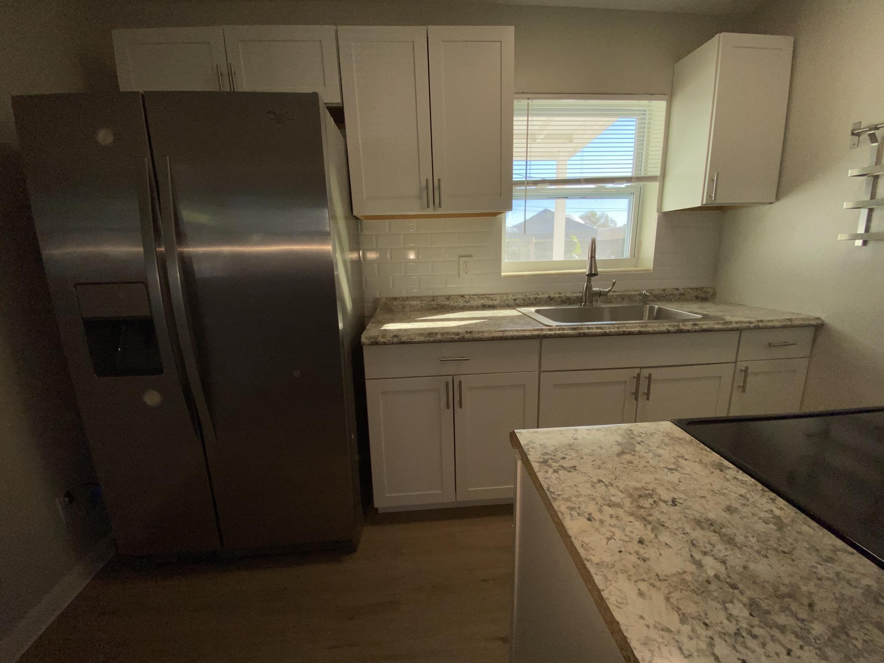 110 Old Spanish Trail Lake Worth, FL 33462 - Photo 2 of 20 Galley Kitchen Area