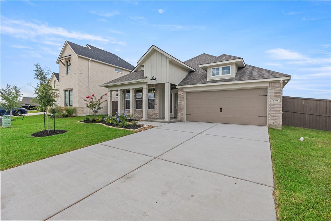 5008 Toscana Loop Bryan, TX 77802 - Photo 2 of 33 a front view of house with yard and green space