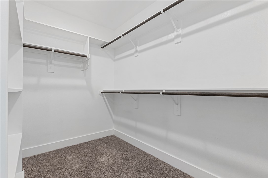 5008 Toscana Loop Bryan, TX 77802 - Photo 28 of 33 a view of an empty walk in closet