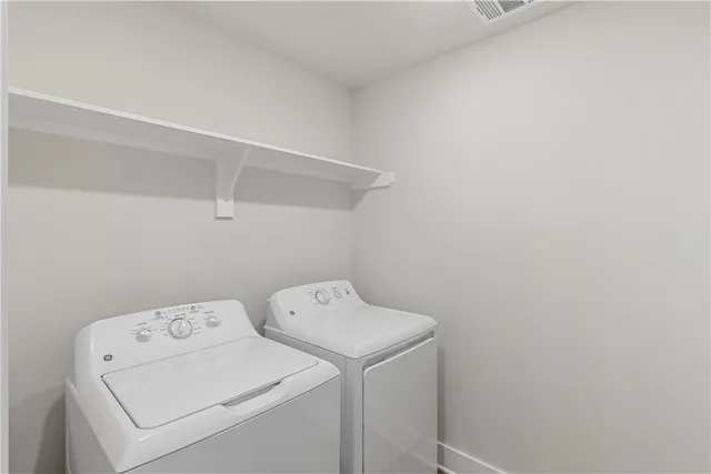 a front view of a house with a large window