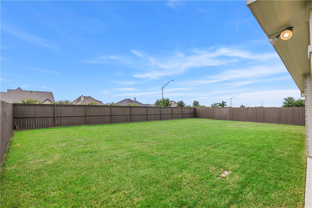 5008 Toscana Loop Bryan, TX 77802 - Photo 31 of 33 a view of a backyard