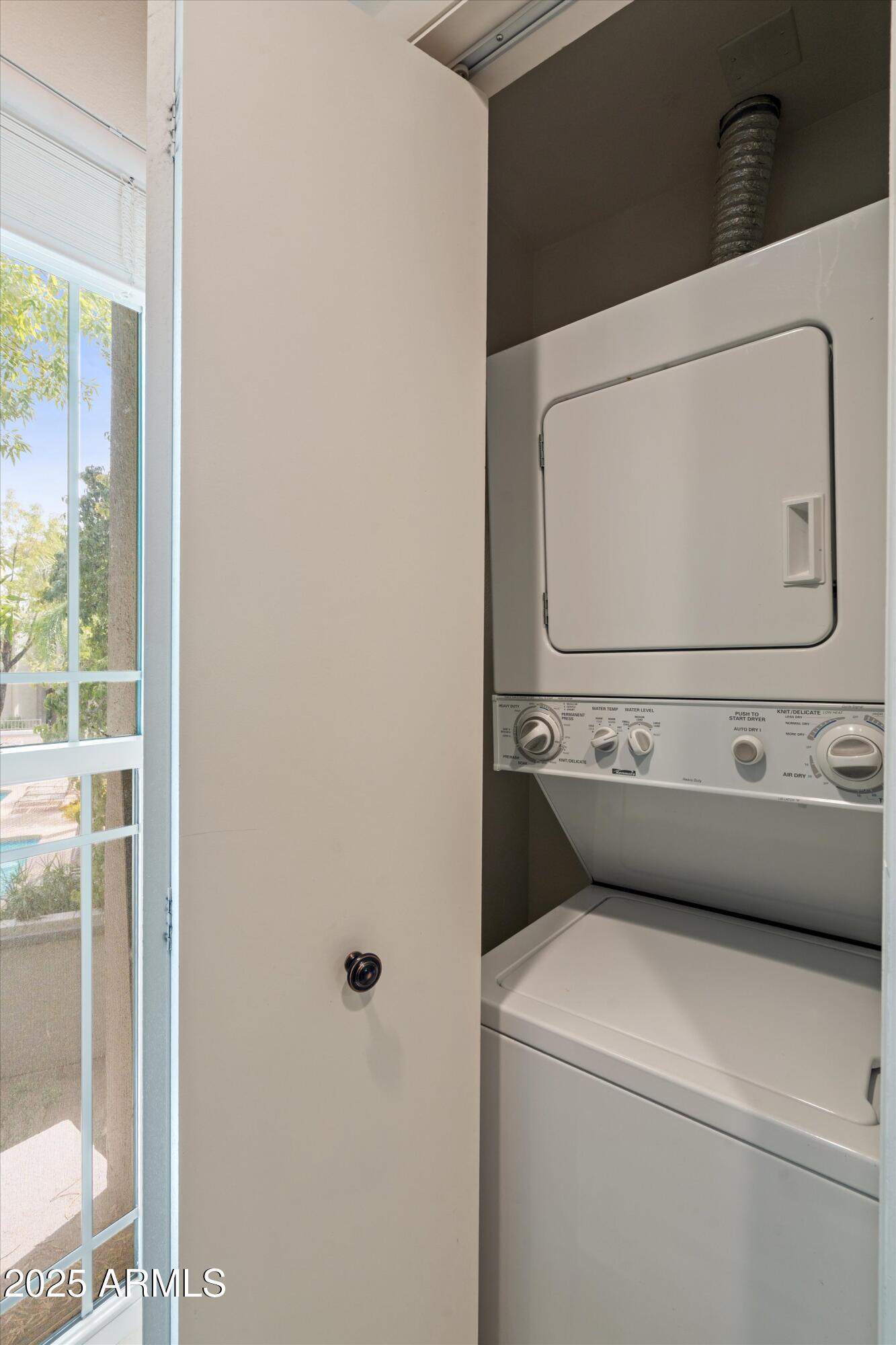 5201 North 24th Street, Unit 206 Phoenix, AZ 85016 - Photo 26 of 39 a utility room with dryer and washer