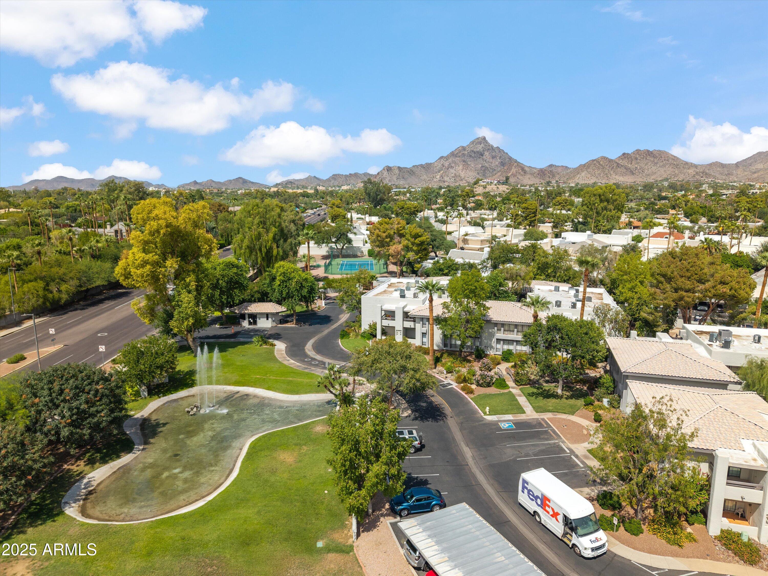 5201 North 24th Street, Unit 206 Phoenix, AZ 85016 - Photo 27 of 39 an aerial view of residential houses with outdoor space and a lake view