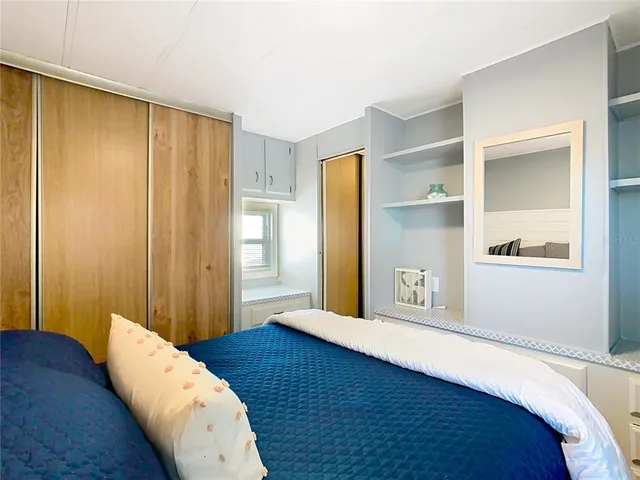 a utility room with closet dryer and washer