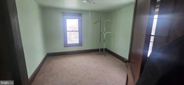 a view of empty room with window