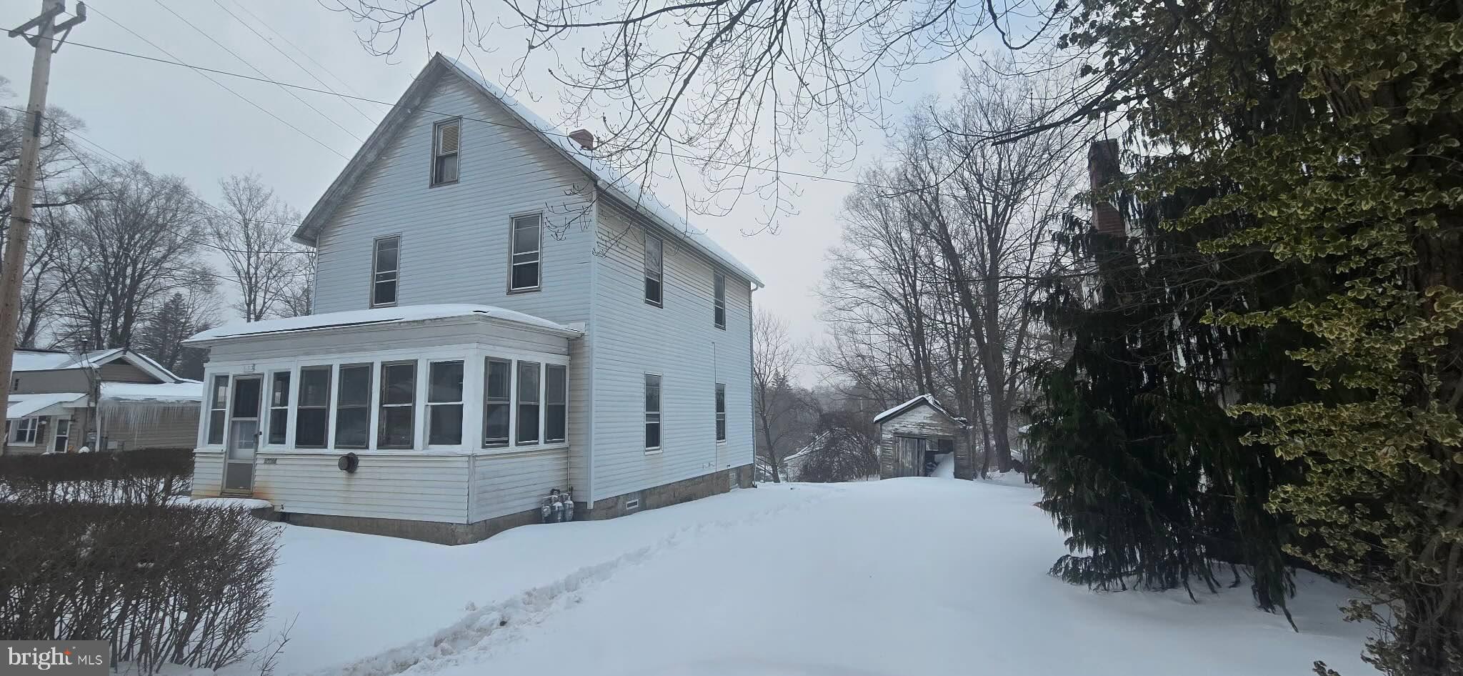 18064 Cussewago Road Meadville, PA 16335 - Photo 2 of 14 a view of a house with a yard