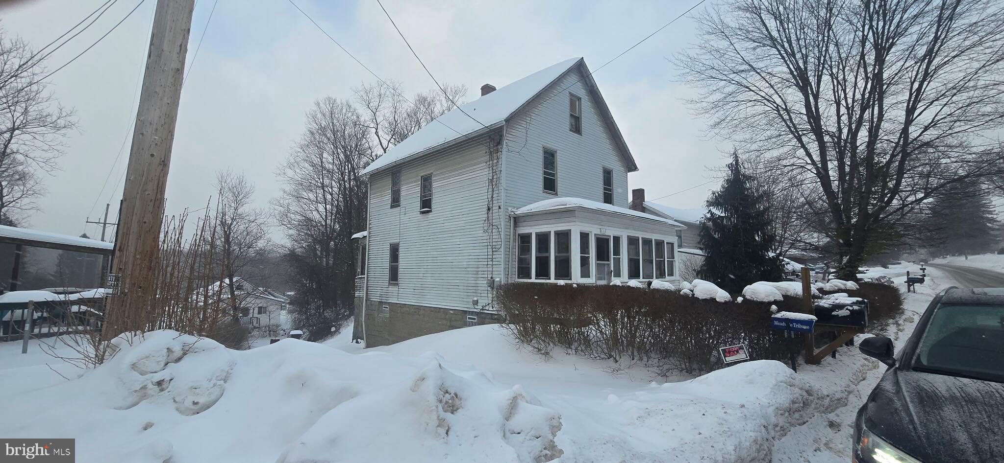 18064 Cussewago Road Meadville, PA 16335 - Photo 3 of 14 a view of a house with a yard