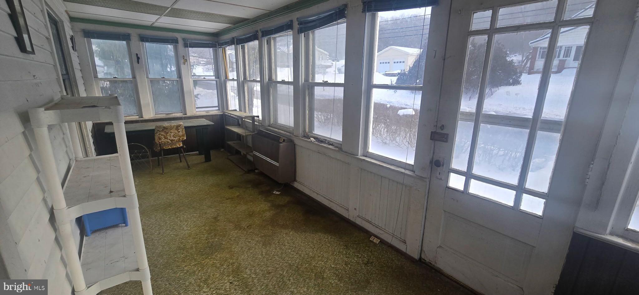 18064 Cussewago Road Meadville, PA 16335 - Photo 4 of 14 a bathroom with a tub and a large window