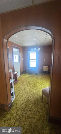 a view of an empty room and window