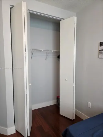 a bathroom with a sink a mirror and a bathtub