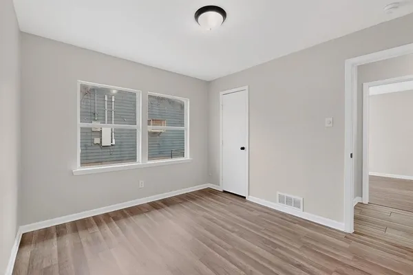 an empty room with windows