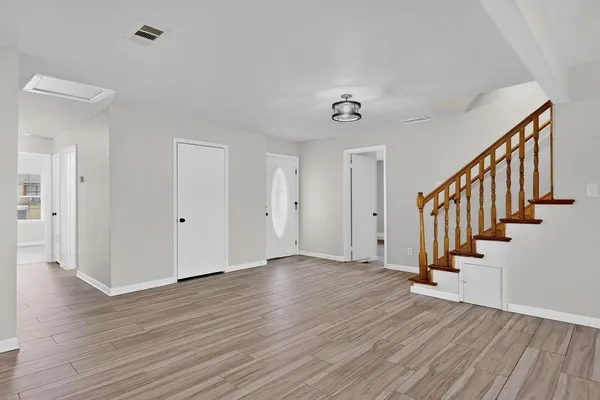 a view of a backyard of the house