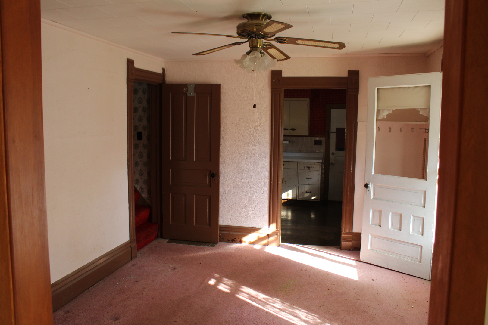 9729 Beaver Valley Road Belvidere, IL 61008 - Photo 28 of 39 a view of a hallway with a chandelier fan and closet