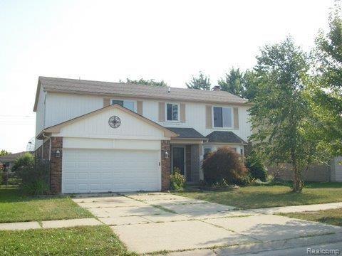 15872 Nathan Drive Macomb, MI 48044 - Photo 1 of 16 FRONT