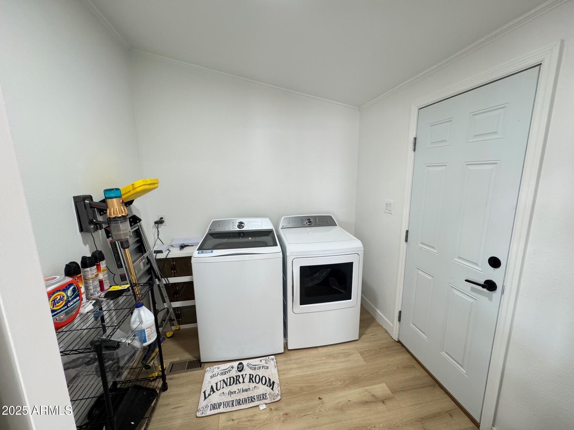 1835 East 20th Avenue Apache Junction, AZ 85119 - Photo 13 of 29 a view of a storage & utility room with washer and dryer