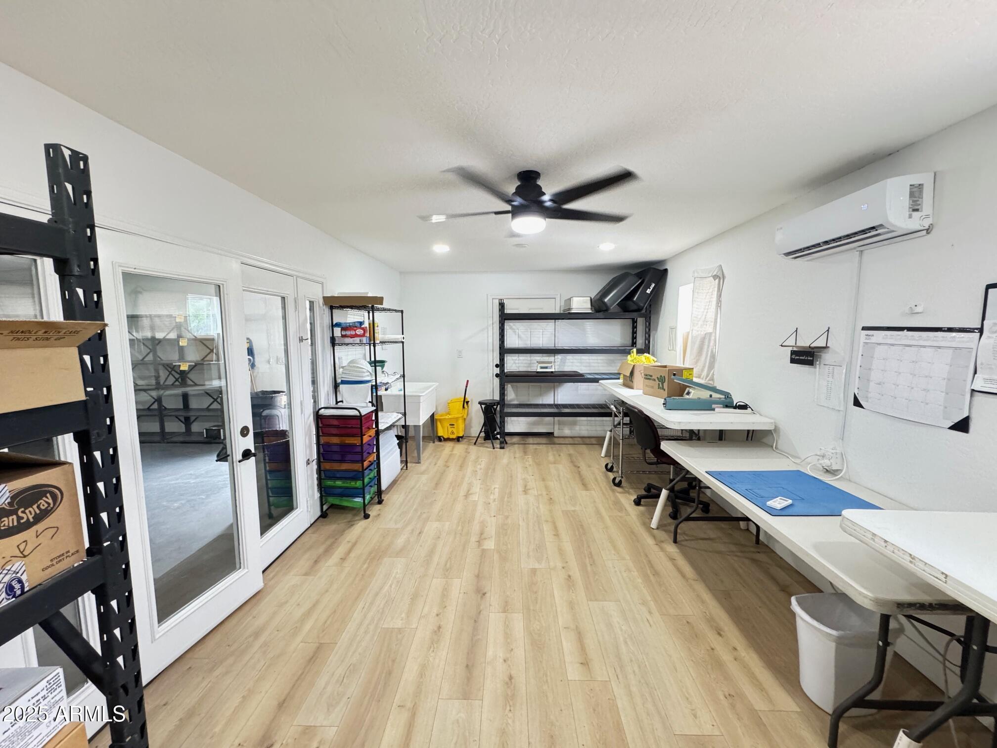 1835 East 20th Avenue Apache Junction, AZ 85119 - Photo 27 of 29 a living room with stainless steel appliances furniture and a view of kitchen