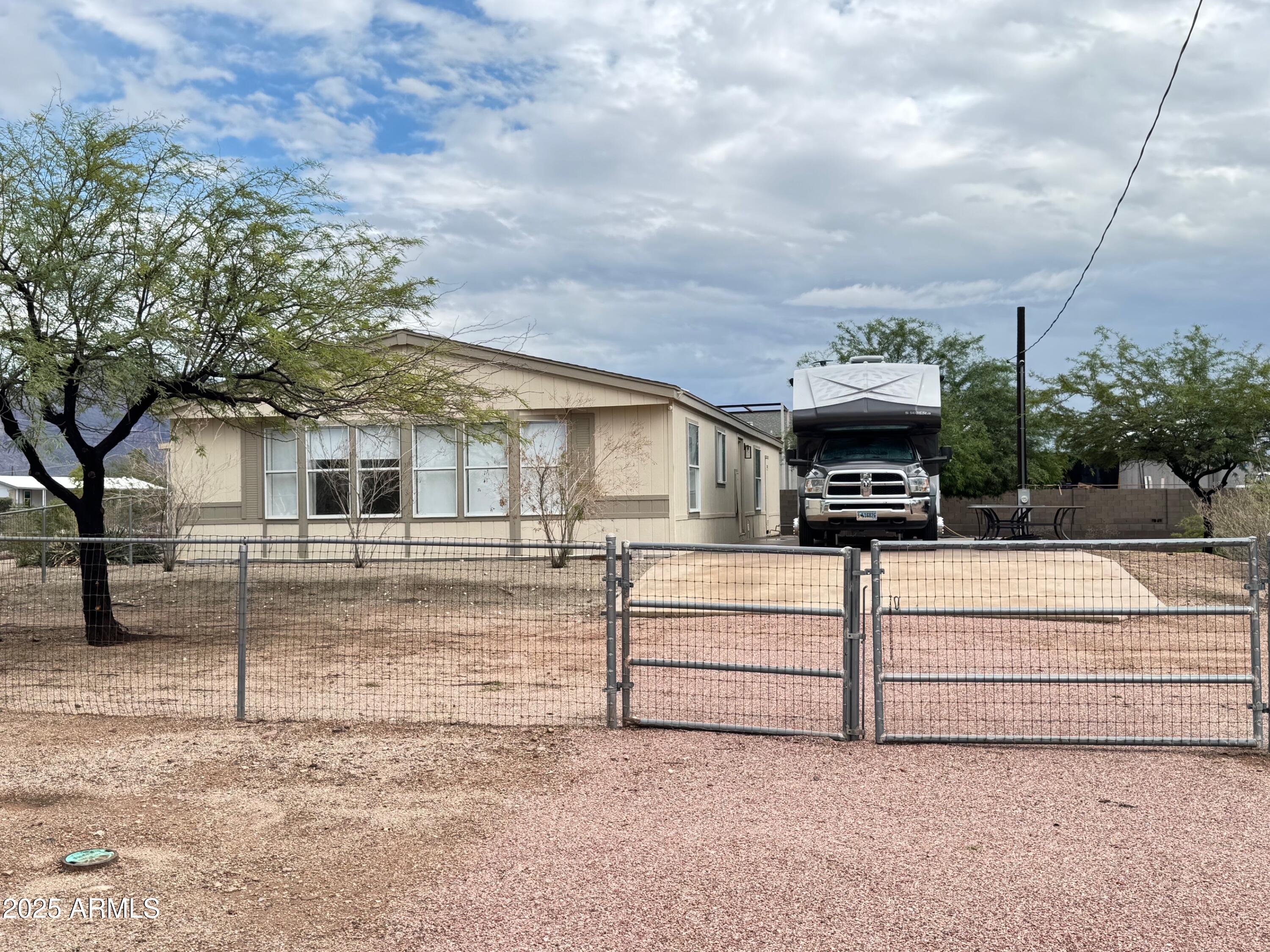 1835 East 20th Avenue Apache Junction, AZ 85119 - Photo 4 of 29 a view of house and outdoor space