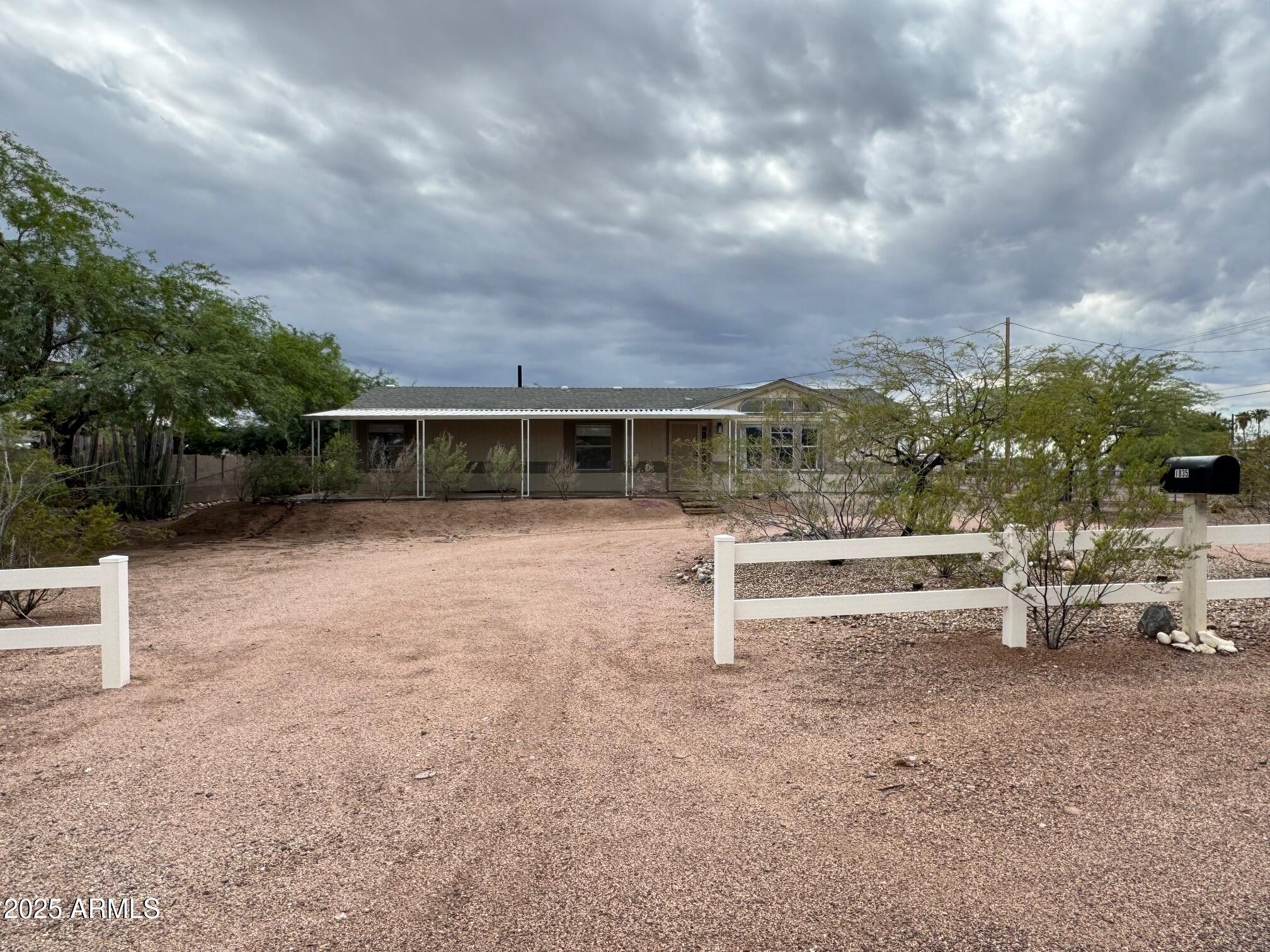 1835 East 20th Avenue Apache Junction, AZ 85119 - Photo 5 of 29 a view of house with outdoor space and porch