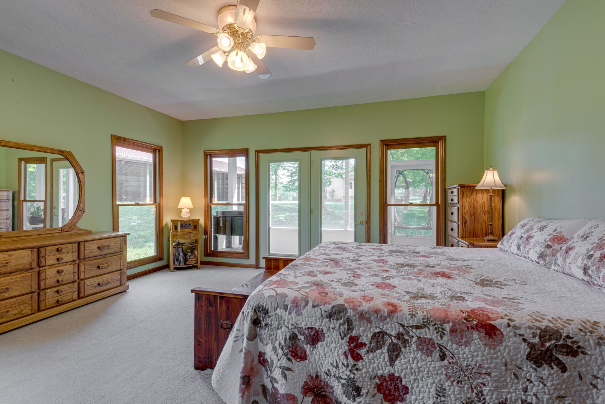 1880 Tom Brown Road McEwen, TN 37101 - Photo 23 of 54 Large Primary bedroom with many windows situated at the back of home