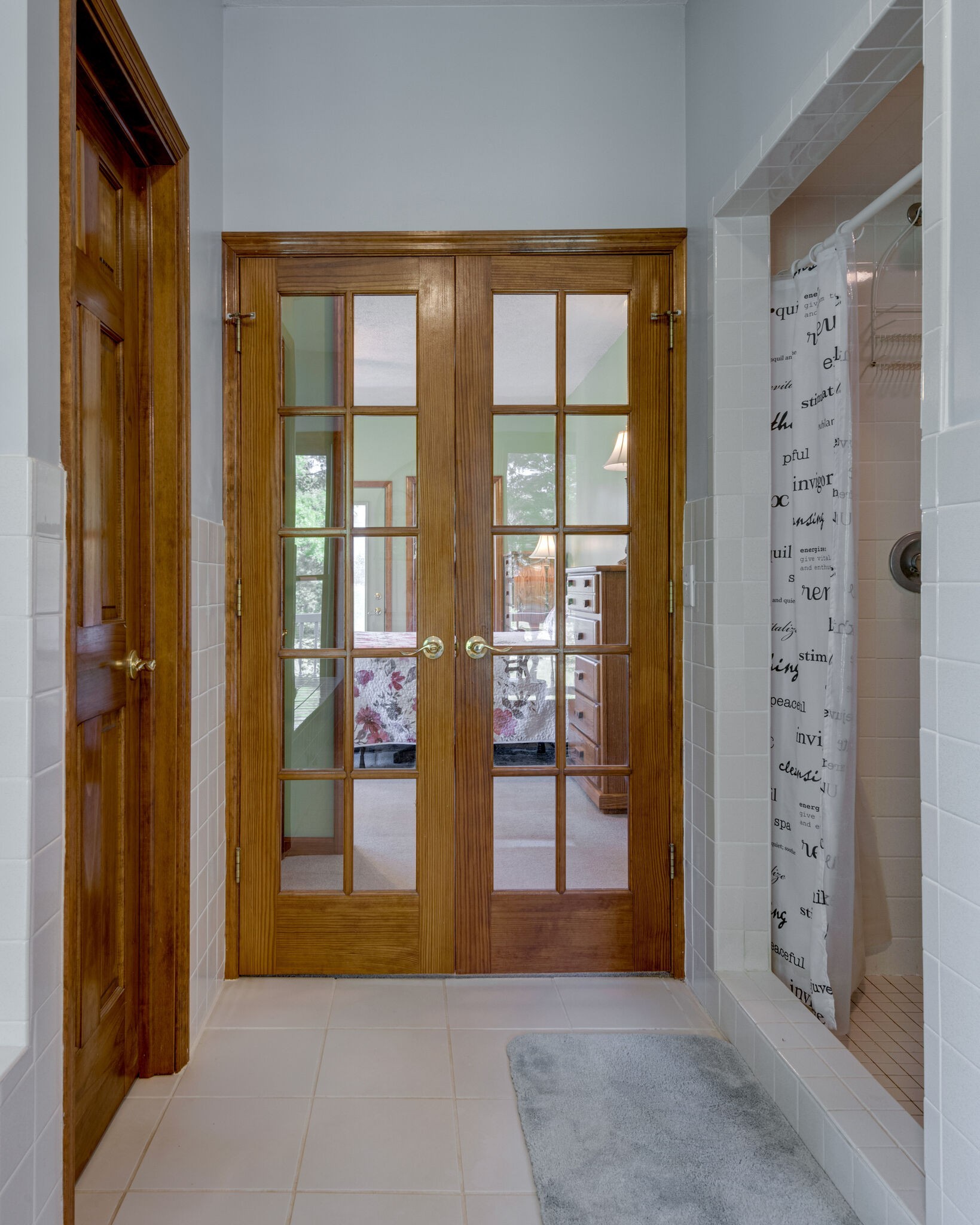 1880 Tom Brown Road McEwen, TN 37101 - Photo 28 of 54 French doors leading from bath to primary bedroom.