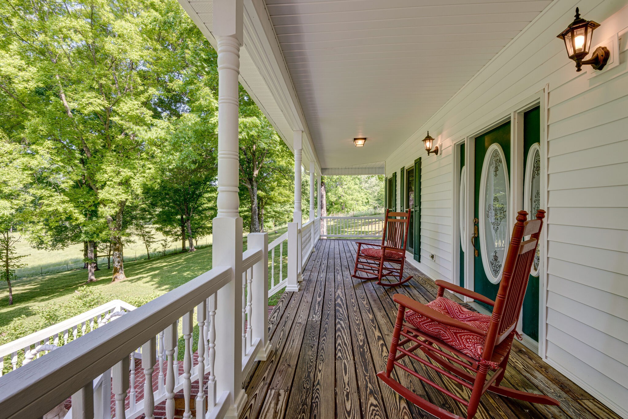 1880 Tom Brown Road McEwen, TN 37101 - Photo 6 of 54 This front porch overlooks the 2 front pastures