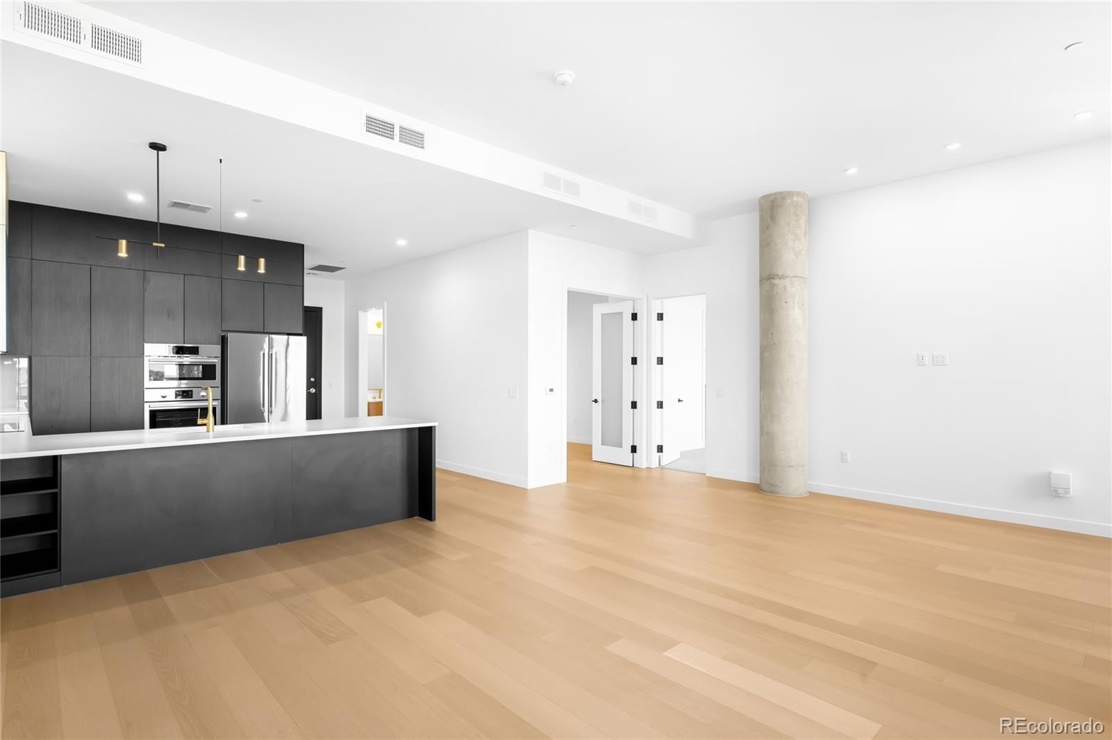3520 Chestnut Place, Unit 1206 Denver, CO 80216 - Photo 11 of 41 a view of kitchen and a window