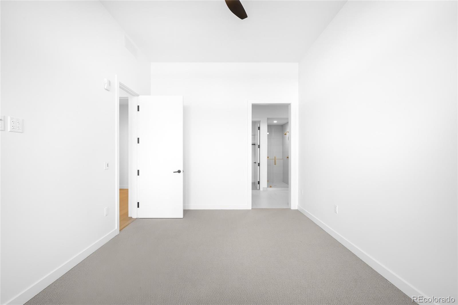 3520 Chestnut Place, Unit 1206 Denver, CO 80216 - Photo 16 of 41 a view of an empty room