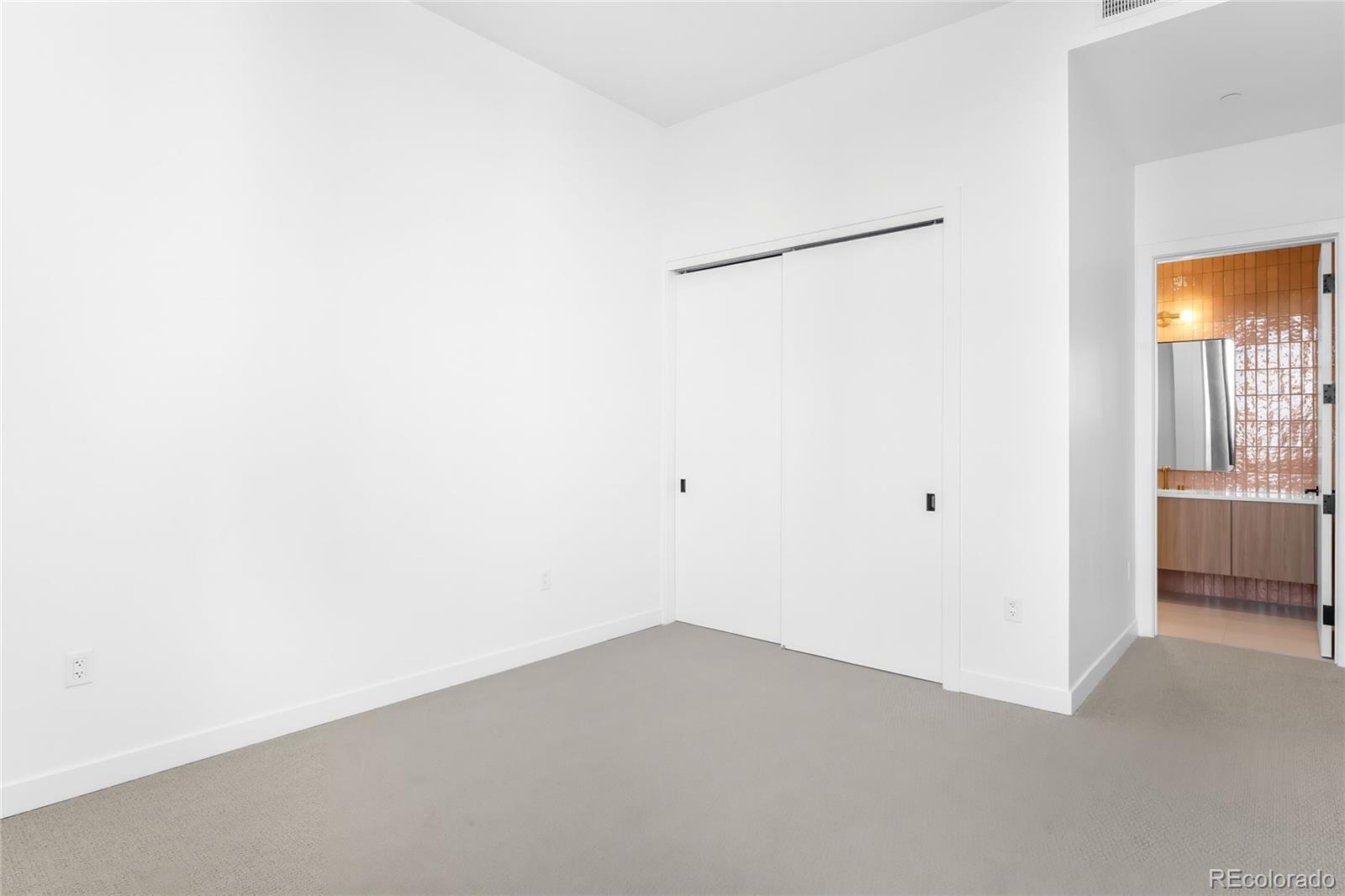 3520 Chestnut Place, Unit 1206 Denver, CO 80216 - Photo 25 of 41 a view of an empty room