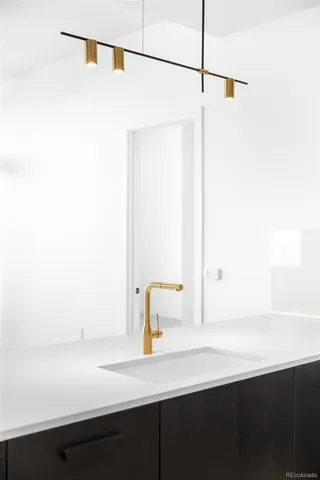 a view of entryway with a sink and mirror