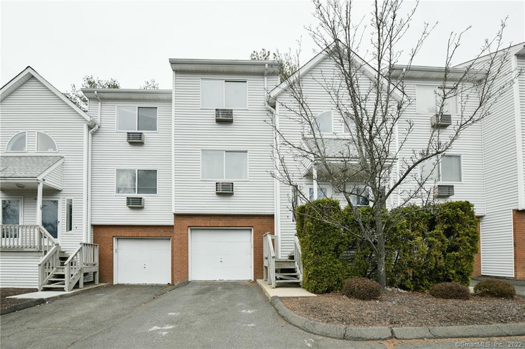 925 Oronoke Road, Unit 11E Waterbury, CT 06708 - Photo 1 of 1 a house view with a outdoor space